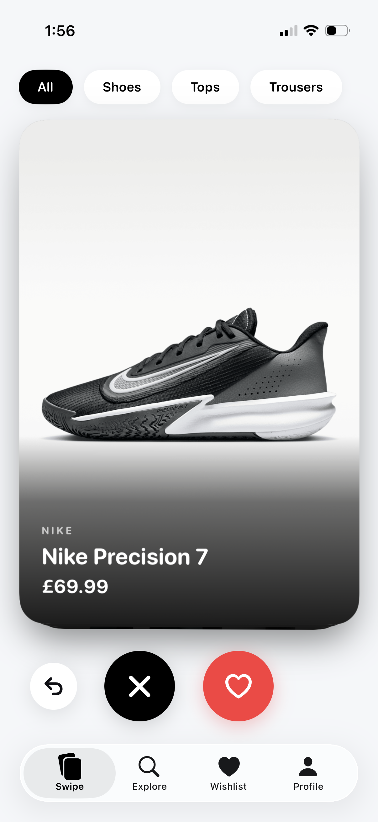 Swyle swipe screen showing a fashion card with like and pass buttons